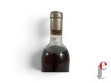 a bottle of wine that is sitting on a table