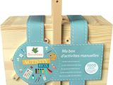 the wooden box contains a variety of crafts and activities for children