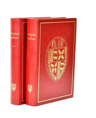 two books that are sitting side by side on a white surface