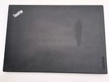 a black mouse pad with a mouse on top of it