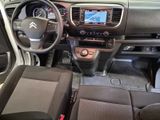 the interior of a car with a steering wheel, dashboard, and dash board