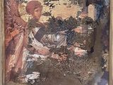 une image représentant un tableau d'un ange dans un cadre en bois