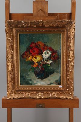 a painting of flowers in a vase on a easel