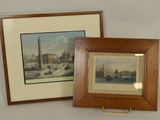 two framed pictures on the wall of a room