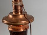 a close up of a lamp that is on a table
