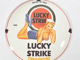 a sign that says lucky strike cigarettes on it