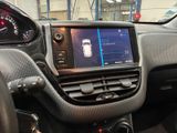 the dashboard of a car with a digital display in the center of it