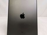 a close up of the back of an ipad on a white surface