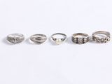 a set of five rings on a white background