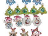 a group of christmas ornaments with snowmen and trees on them