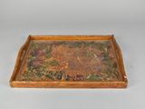 a wooden tray with a painting on it on a table