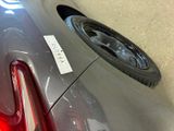 a close up of a car with a sticker on the side of it