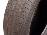 a close up of a tire on a white background