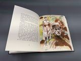 un livre ouvert avec le dessin d'un homme et d'une femme