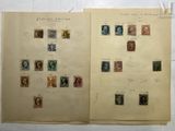 an open book with a lot of different stamps on it
