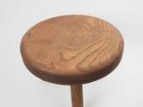 a wooden stool with a wooden seat on a white background