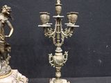 pair of antique bronze figurines of a woman and a clock