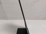 a close up of a tablet computer sitting on top of a table