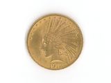 an image of a gold coin with a headdress on it