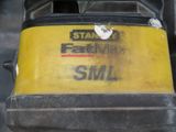 a close up view of a yellow and black machine