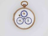 a small pocket watch that has a blue and white design on it