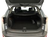 the back of a car with the trunk open and the seats down