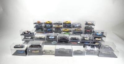 a lot of toy cars that are sitting in a box