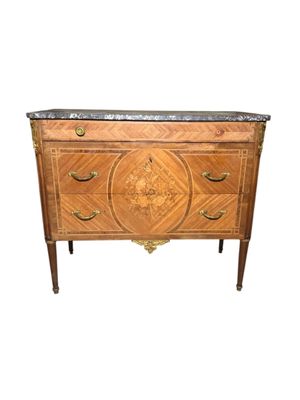 an image of a wooden chest of drawers with a marble top