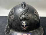 an old fireman ' s helmet with the emblem of a fire department