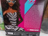the barbie doll is in the box and ready to be put on the shelf
