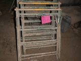 a pile of old chairs and a chair in a dirty room