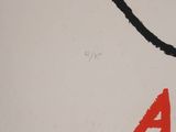 an image of a black and red painting on a white wall