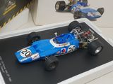 a model of a racing car on display in a display case
