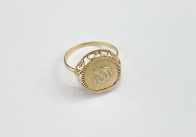 an image of a gold ring with the letter d on it