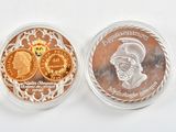 two coins that are sitting in a clear container