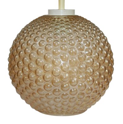 an image of a glass light fixture with a white cord