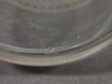 a close up of a glass bowl on a table