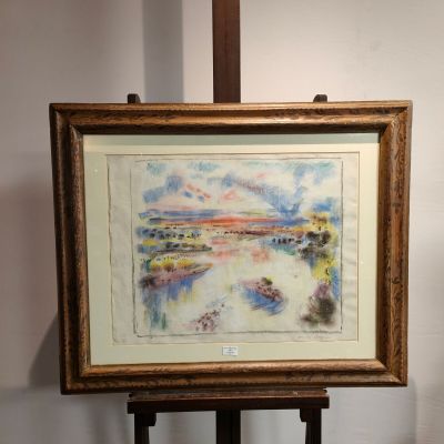 une image d'un tableau sur un chevalet dans une pièce