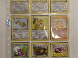 a lot of pokemon cards that are on the wall