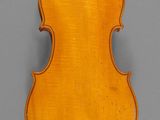 an old violin with a wooden back and a long neck