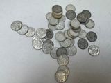 a lot of coins that are on the table