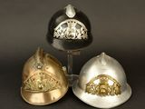 three helmets that are sitting next to each other
