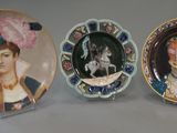 three plates that are sitting on a table