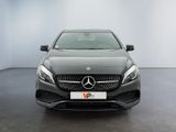 the front view of a mercedes cla in a showroom