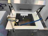 an image of a machine that is being used to make liquid