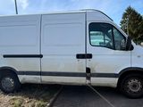 a white van parked on the side of the road