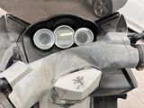 a motorcycle that is parked on the side of the street