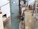 a machine that is sitting inside of a building