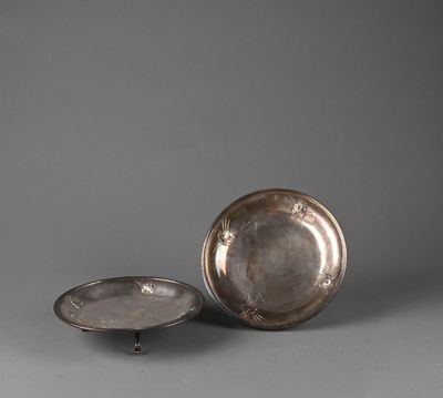 pair of silverplated dishes on stands, with a silver plate in the middle