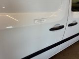 a white van with a sticker on the side of it